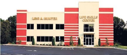 Parking lot view of the Lois A. hunter Life Skills Center.