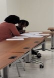 A student and a tutor.