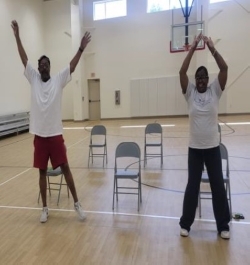 A couple people participating in the Monday senior citizens workout.