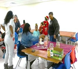 People standing and talking around tables.