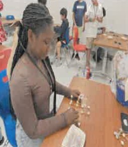 A women making a sculpture for STEM.