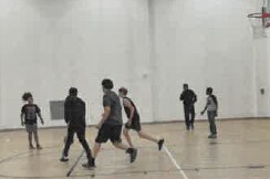 People playing basketball.