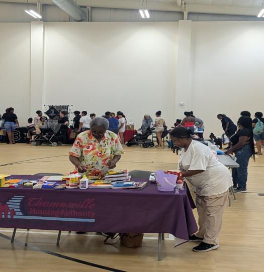 A table set up with various school supplies.