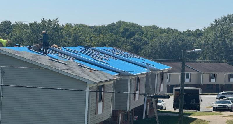 A James Avenue apartment building with roof under construction.
